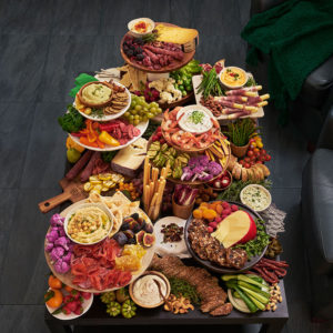 Grazing table with variety of dips, hummus and vegetables/crackers beauty image