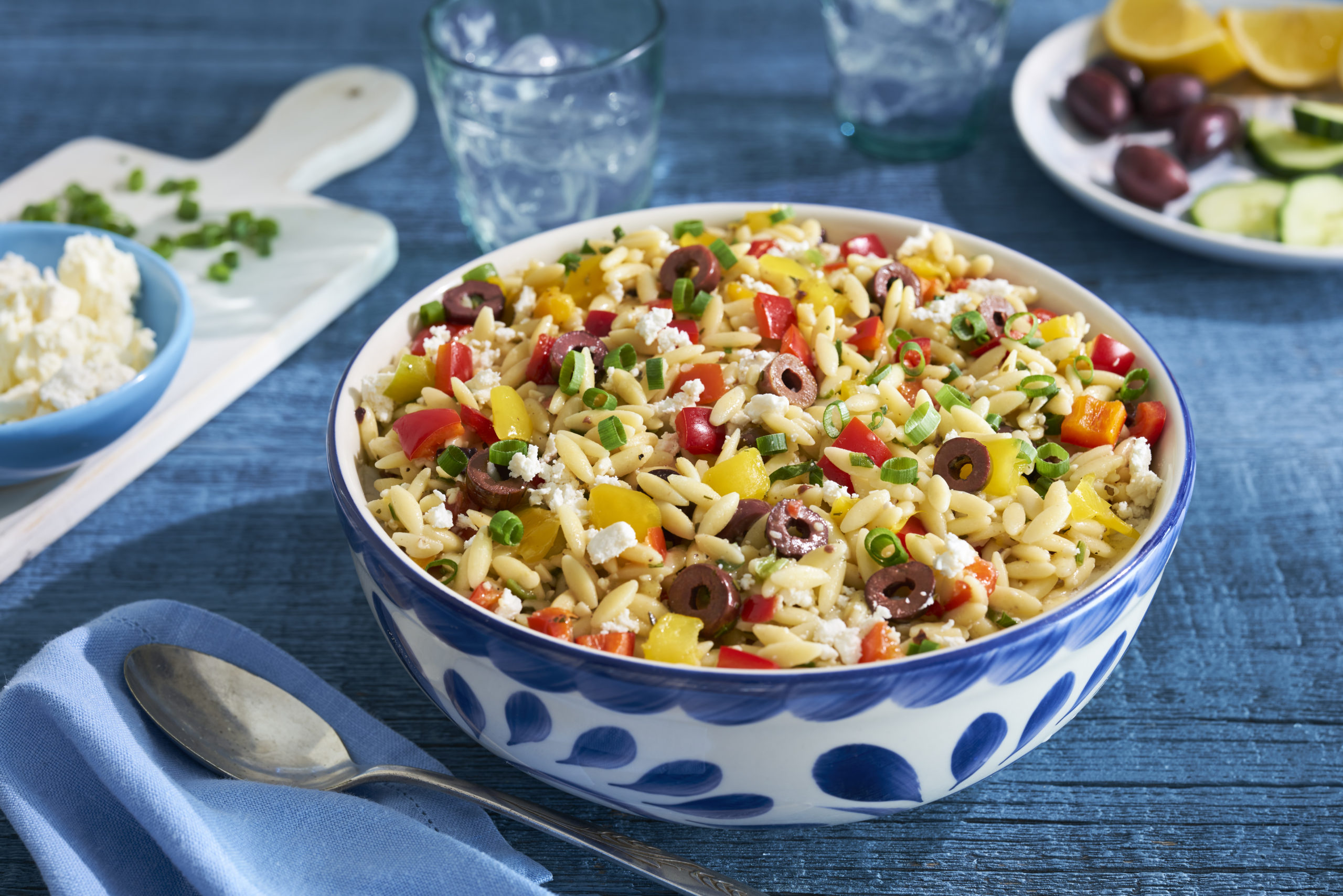 Greek orzo salad in bowl beauty image