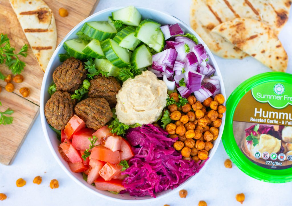 Shawarma buddha bowl with vegetables using summer fresh's roasted garlic hummus beauty image