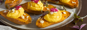 Sweet Potato hummus on roasted sweet potato product beauty image